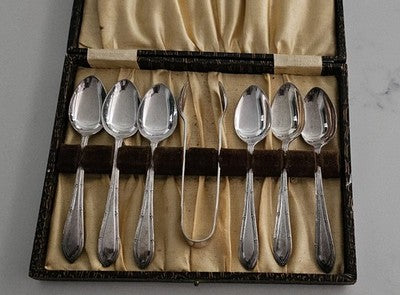 vintage 7-piece silver-plated tea service set presented in its original display