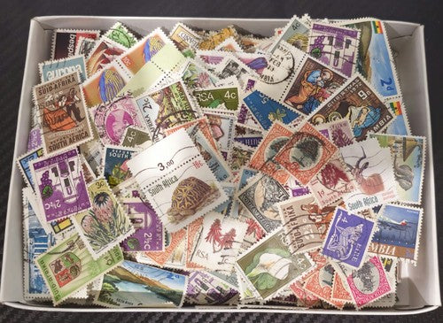 More than 400 pcs Vintage International off paper Stamps pick from a big amount