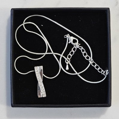Modern Silver Tone Twisted Ribbon Pendant Necklace with Accented Crystals