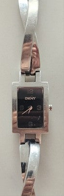 DKNY NY-3383 Ladies Twist Bangle Watch Solid Stainless Steel Rectangular Dial