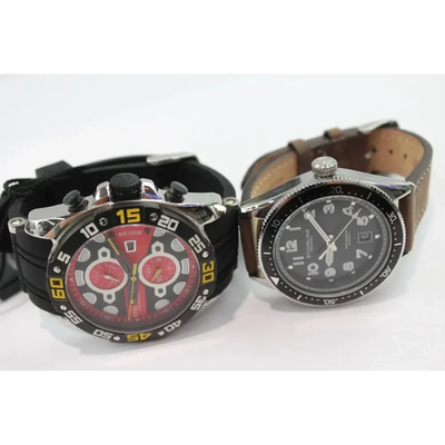 Two watches with different face designs on a white background from our Pre-Owned & Secondhand Watches collection
