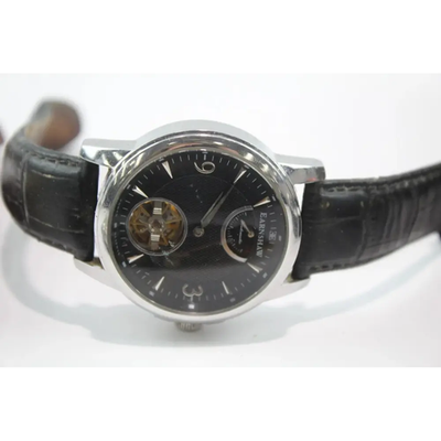 Black wristwatch with a detailed face on a white background from our Pre-Owned & Secondhand Watches
collection 