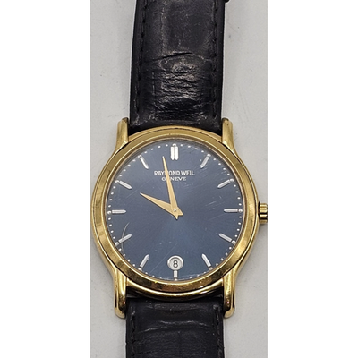 Watch with black leather strap and gold case on a white background from our Pre-Owned & Secondhand Watches
