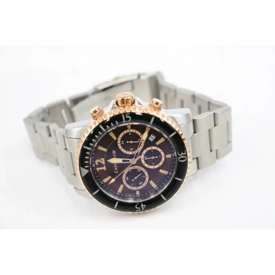 Wristwatch with a black face and rose gold accents on a white background from our Pre-Owned & Secondhand Watches collection 
