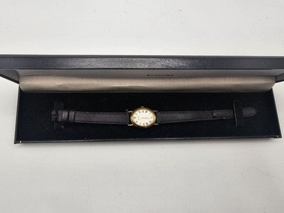Accurist London Gold Tone Women's Quartz Watch LS599 Roman Dial Black Strap Box