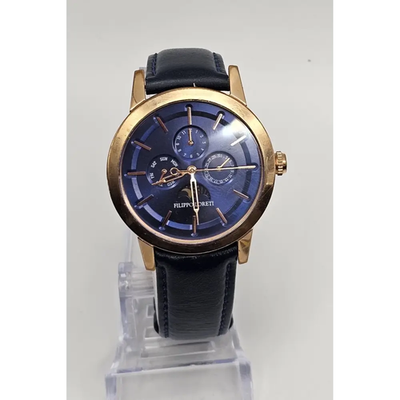 Wristwatch with black leather strap and gold case on a white background from our Pre-Owned & Secondhand Watches collection