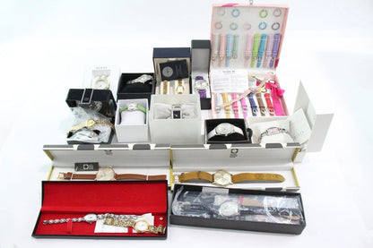Collection of jewelry and accessories in open boxes on a white background from our Pre-Owned & Secondhand Watches collection
