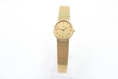 Gold watch with a mesh band on a white background from our Pre-Owned & Secondhand Watches
 collection