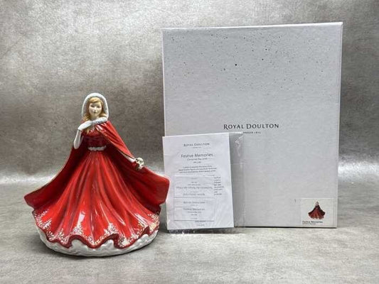 Royal Doulton 'Festive Memories' porcelain figure - Christmas Day 2016, HN 5781.