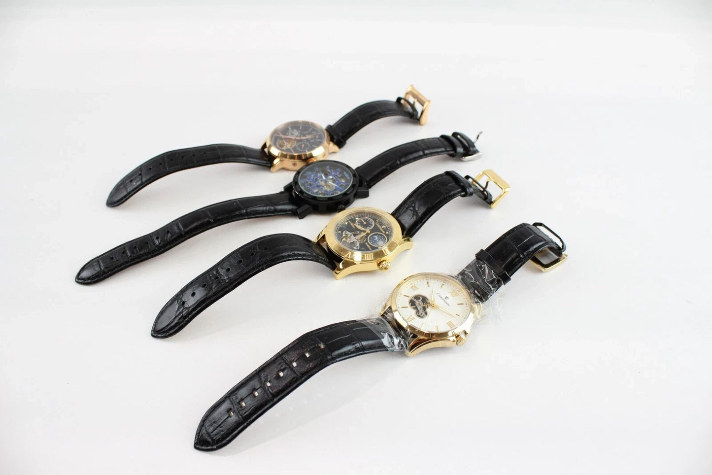 4x Men's Modern Mechanical Watches – Winner, Continuum – In Working Condition