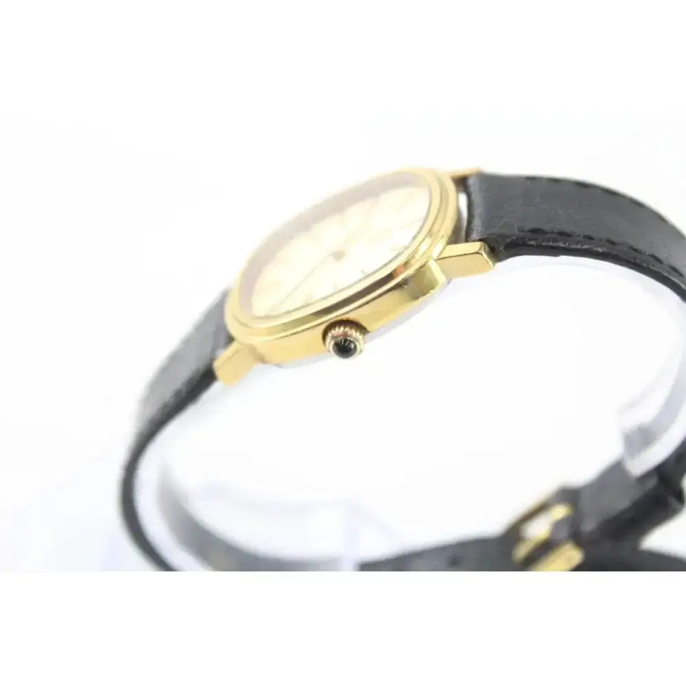 Omega De Ville ladies gold tone watch side view
