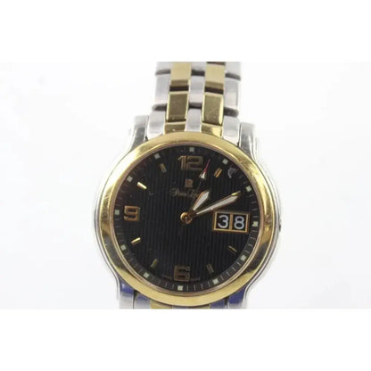 A two-tone stainless steel and gold wristwatch with a black dial, featuring gold-tone numerals and hands, a date window at 3 o'clock, and a two-tone metal link bracelet.
